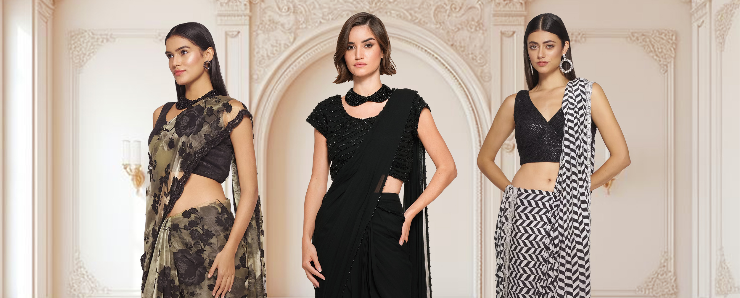 woman flaunting a beautiful black designer saree