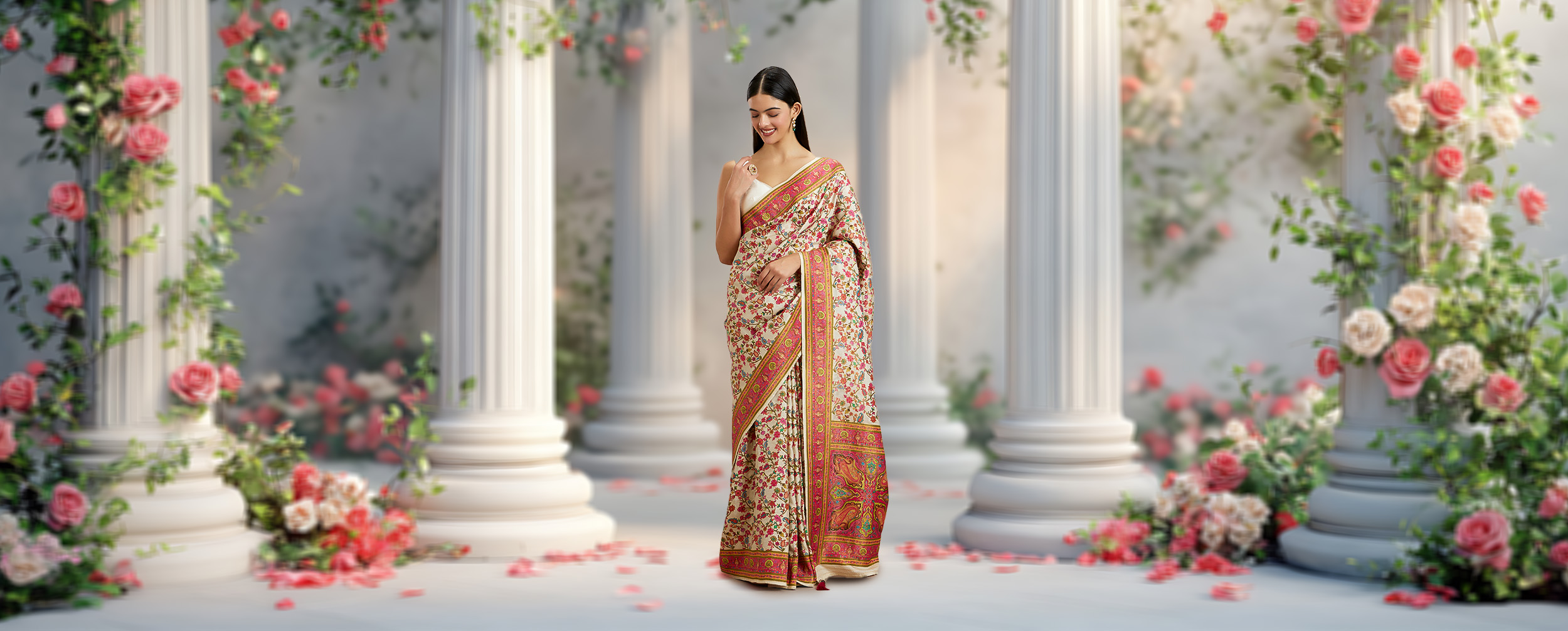 Woman in a floral saree, ideal for garden weddings, stands in a lush setting. Perfect for bridal planning and event dressing.